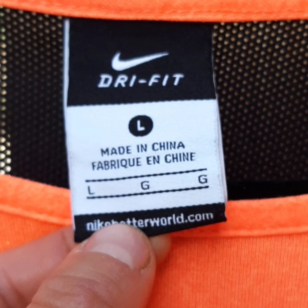 Nike long sleeve orange top w/ black mesh large
